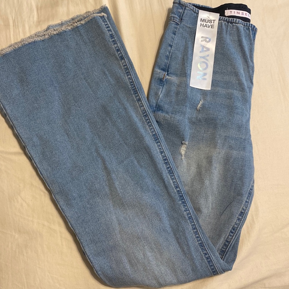 ripped jeans with wide bottom